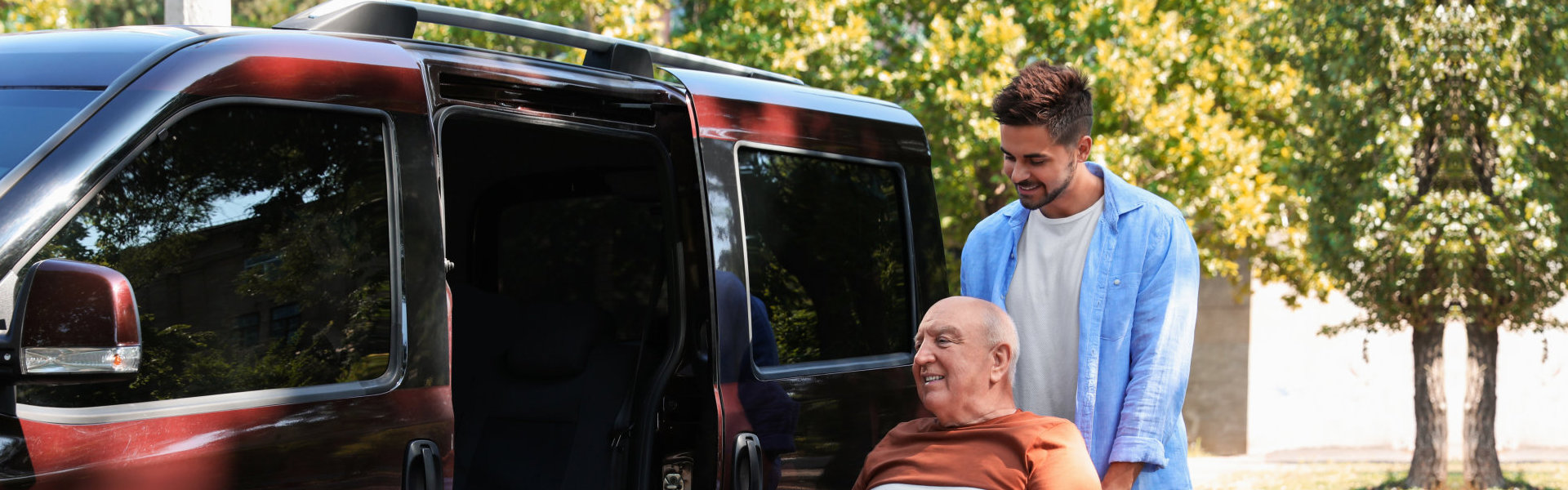 Man helping elderly ride