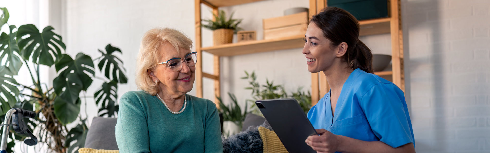 Caregiver interviewing elderly