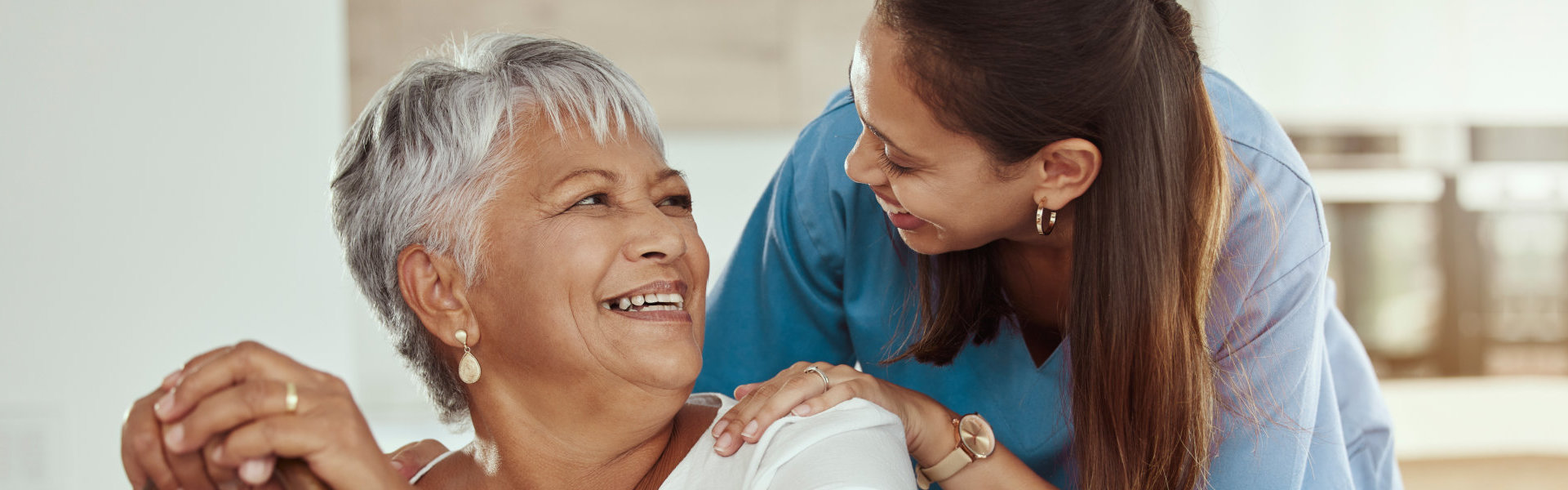 Elderly looking at caregiver